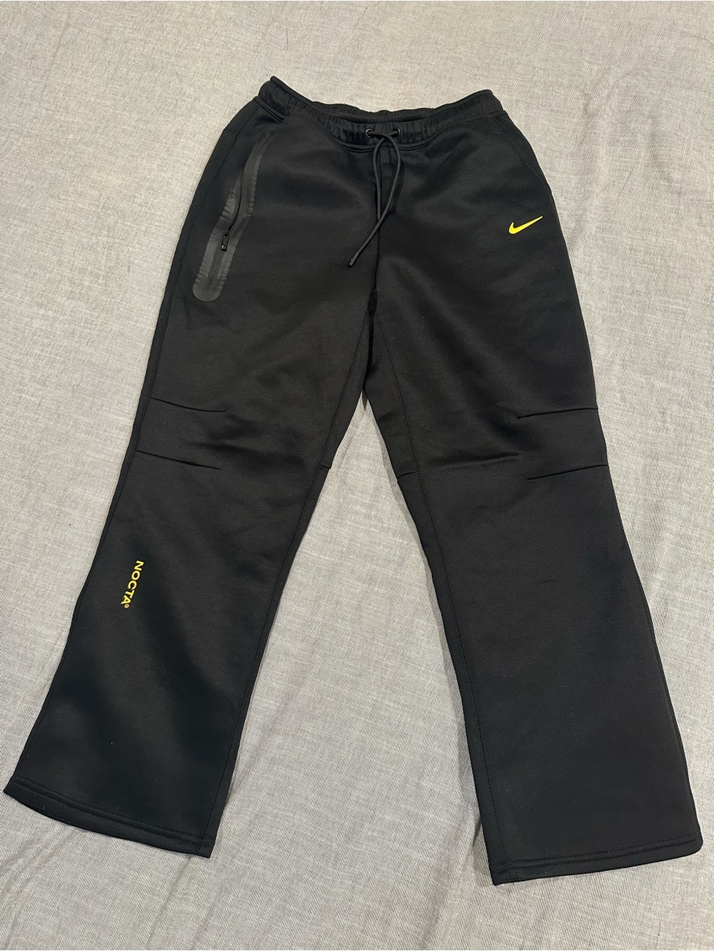 Nike x NOCTA Tech Fleece Black Sweatpants with Yellow Swoosh and Accents